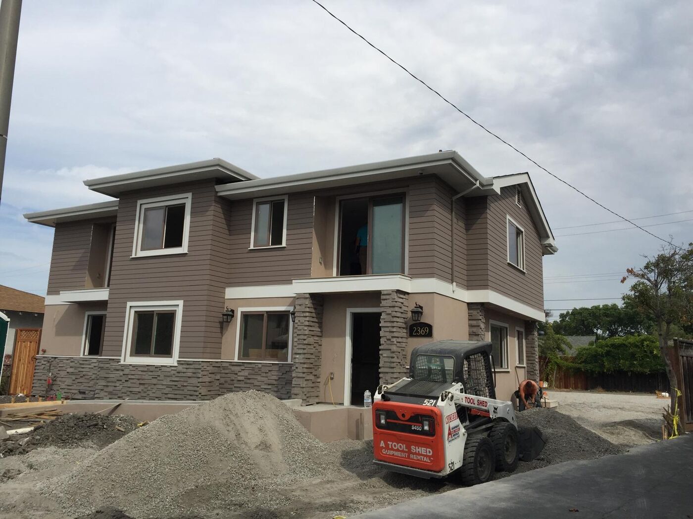 Two-story custom stucco home exterior